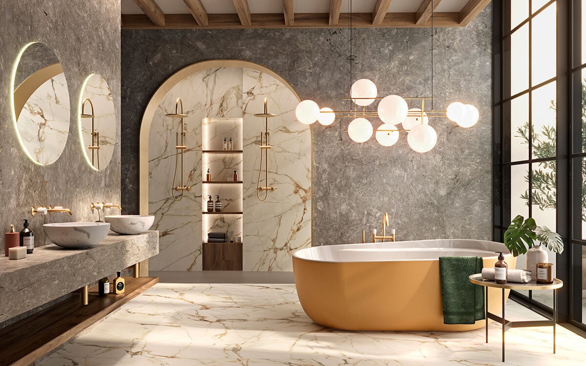 Bathroom with gold finish taps and bathtub
