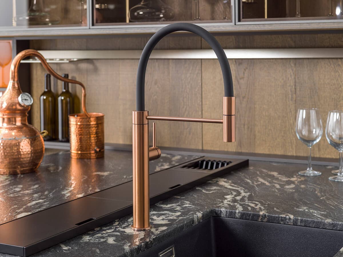 Black and copper kitchen tap