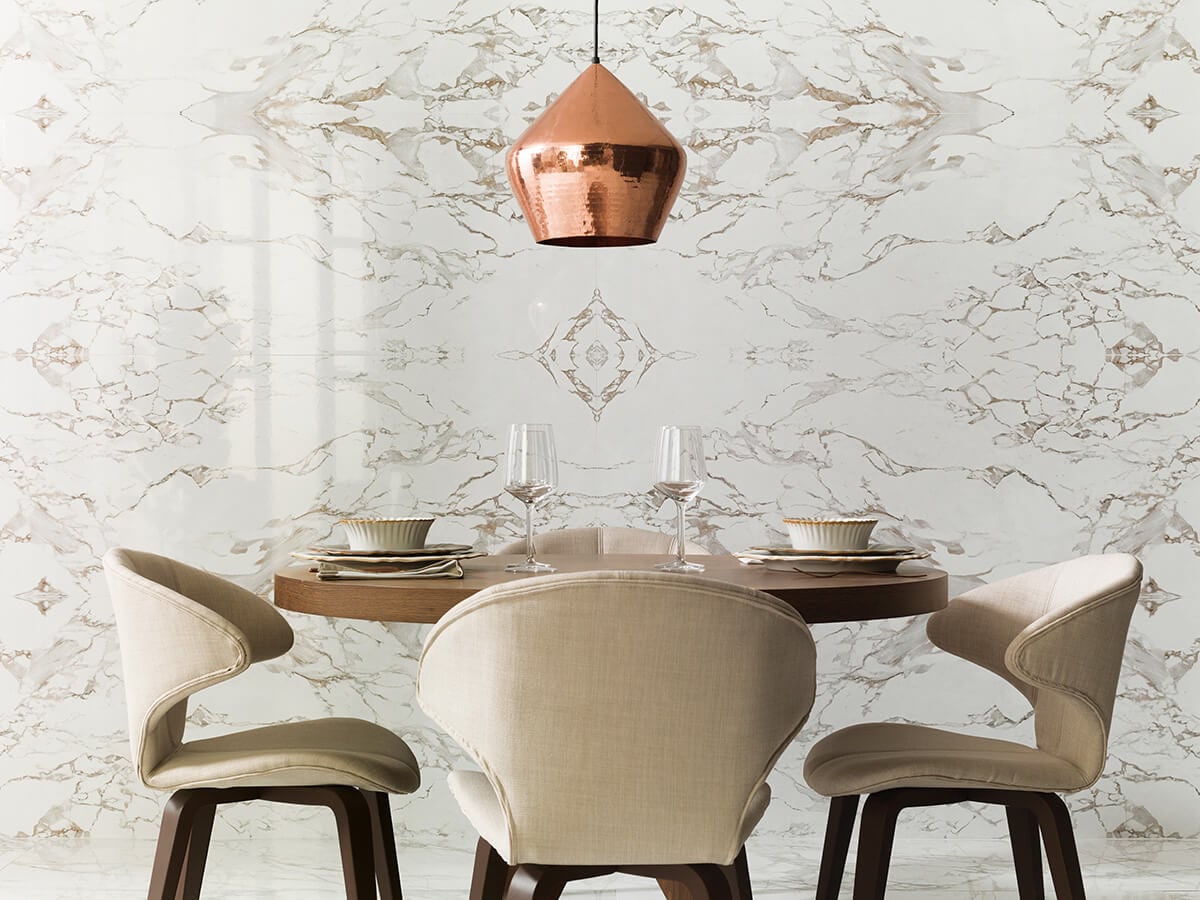 Dining room with marble effect tiles