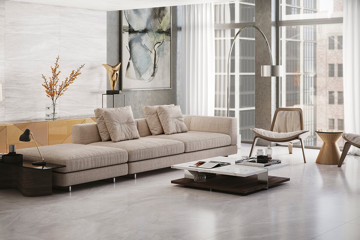 Living room with grey marble effect tiles on floors and walls