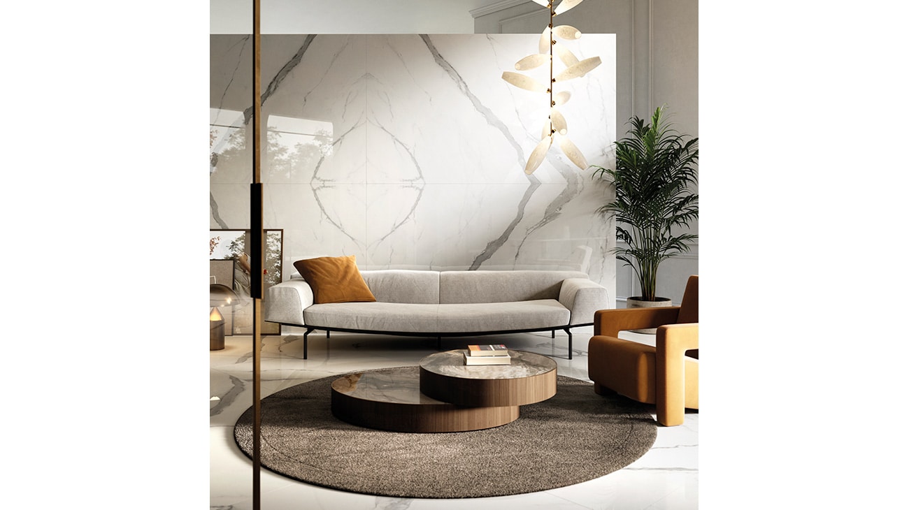 Photo caption: Living room with yellow accessories and Aria White Polished XTONE® floor and wall tiles.  