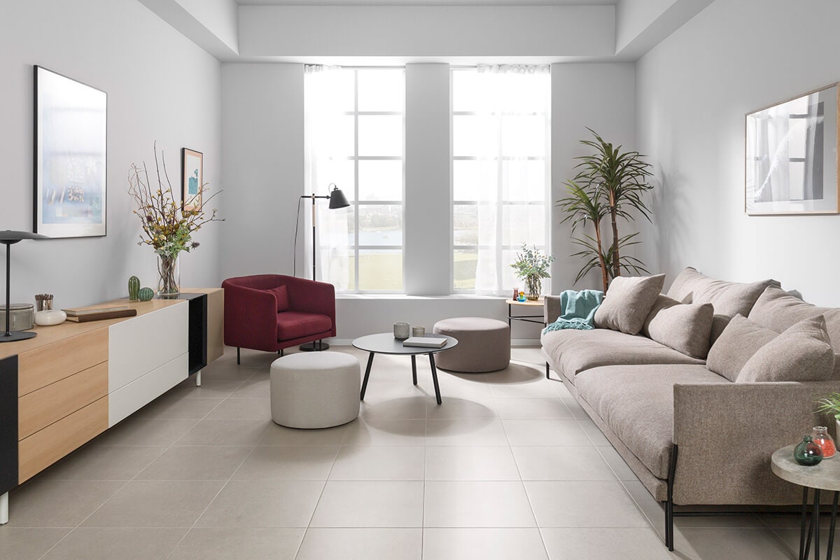 Soft tones minimalist living room with a dark red armchair