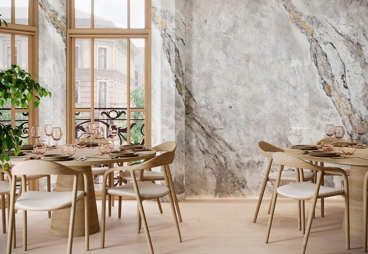 Dining room with stone effect wall tiles by Porcelanosa